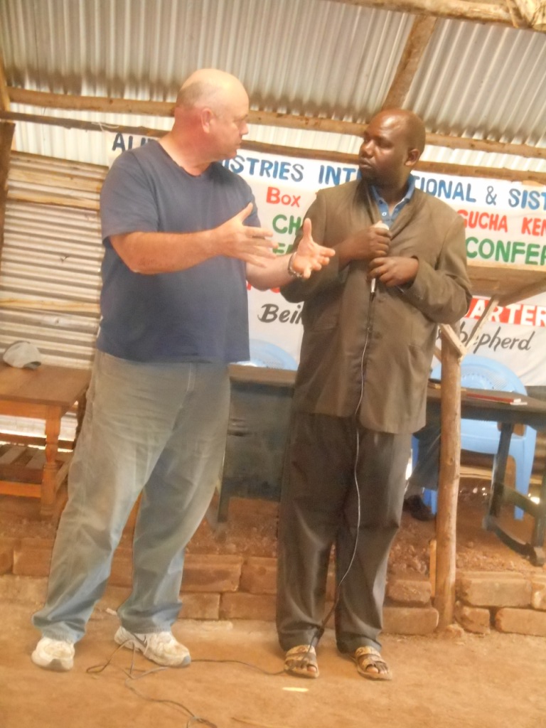 Evangelist Jay MacDonald teaching and Bishop Javan interpreting to Kisii language at Riangisa Church